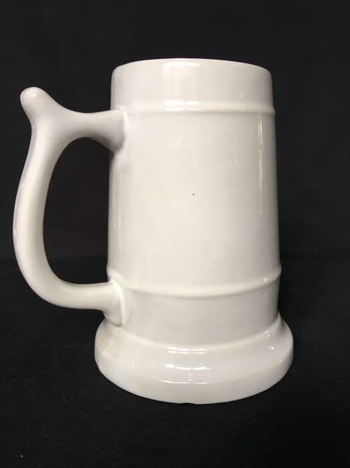 A LOVELY BEER TANKARD FROM RHODES UNIVERSITY BRANDED WITH THEIR LOGO/ MOTTO