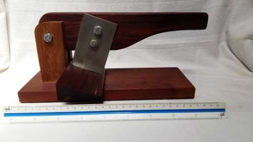A Stunning Vintage Black Wood Bilton Cutter, From Knysna with vintage green felt underneath.