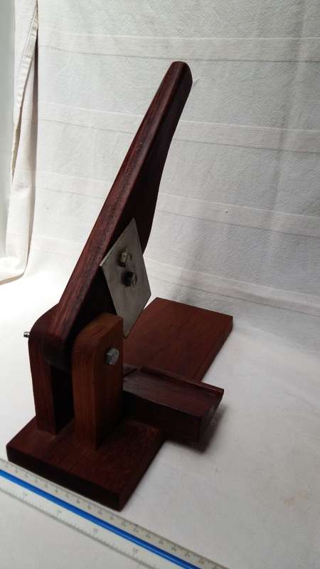 A Stunning Vintage Black Wood Bilton Cutter, From Knysna with vintage green felt underneath.
