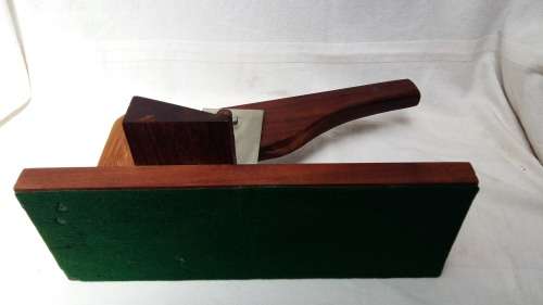 A Stunning Vintage Black Wood Bilton Cutter, From Knysna with vintage green felt underneath.