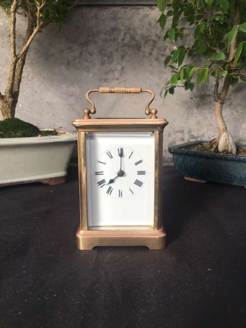 WOW !!!! CLASSIC BRASS FRENCH CARRIAGE CLOCK STAMPED "MADE IN FRANCE" WITH A PORCELAIN FACE