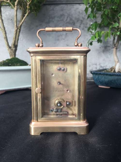 WOW !!!! CLASSIC BRASS FRENCH CARRIAGE CLOCK STAMPED "MADE IN FRANCE" WITH A PORCELAIN FACE
