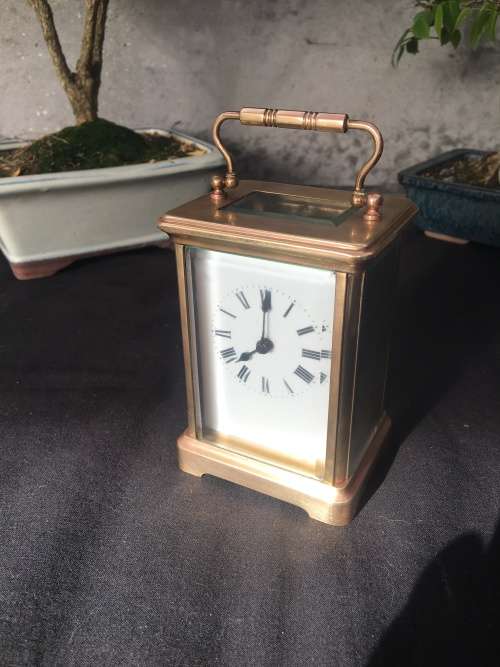 WOW !!!! CLASSIC BRASS FRENCH CARRIAGE CLOCK STAMPED "MADE IN FRANCE" WITH A PORCELAIN FACE