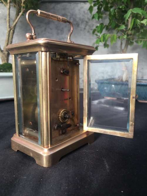 WOW !!!! CLASSIC BRASS FRENCH CARRIAGE CLOCK STAMPED "MADE IN FRANCE" WITH A PORCELAIN FACE