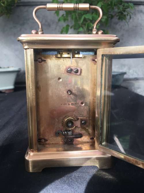 WOW !!!! CLASSIC BRASS FRENCH CARRIAGE CLOCK STAMPED "MADE IN FRANCE" WITH A PORCELAIN FACE