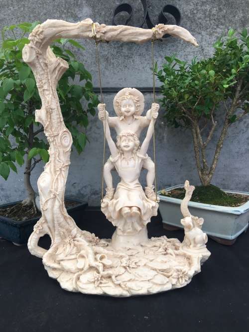 WOW !!! STUNNING LARGE RESIN FAIRYTALE STYLE ORNAMENT OF KIDS SWINGING IN A TREE