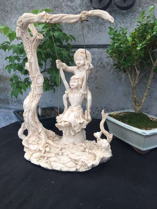 WOW !!! STUNNING LARGE RESIN FAIRYTALE STYLE ORNAMENT OF KIDS SWINGING IN A TREE