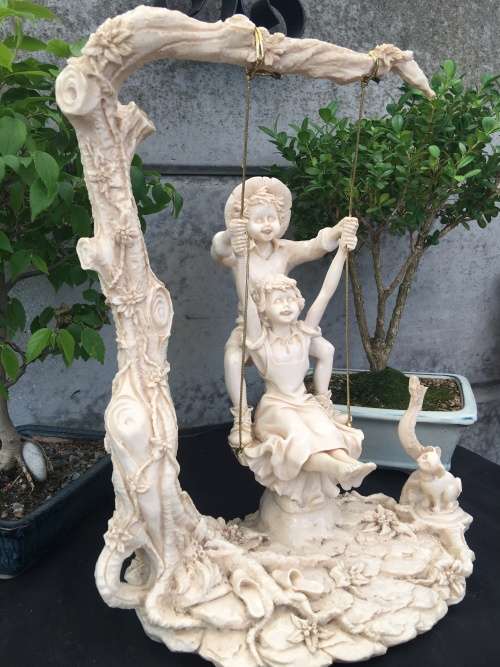 WOW !!! STUNNING LARGE RESIN FAIRYTALE STYLE ORNAMENT OF KIDS SWINGING IN A TREE
