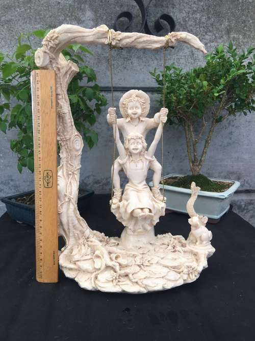 WOW !!! STUNNING LARGE RESIN FAIRYTALE STYLE ORNAMENT OF KIDS SWINGING IN A TREE