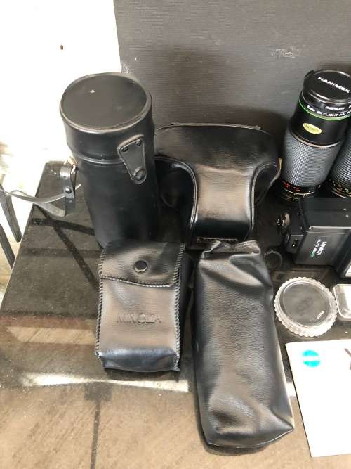 WOW !!!  COMPLETE MINOLTA X~700 CAMERA WITH 2 EXTRA LENSES AND MANY OTHER EXTRAS , CHECK DESCRIPTION
