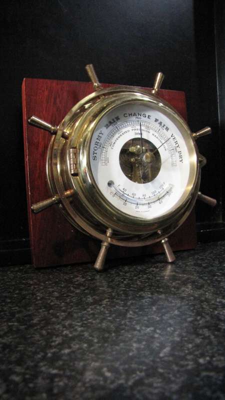 STUNNING GERMAN STOCKBURGER SHIPS WHEEL BAROMETER ON A WOODEN BASE IN FULL WORKING ORDER