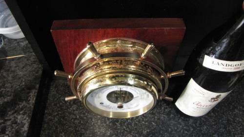STUNNING GERMAN STOCKBURGER SHIPS WHEEL BAROMETER ON A WOODEN BASE IN FULL WORKING ORDER
