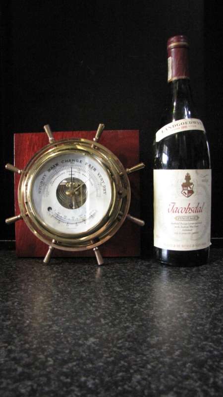 STUNNING GERMAN STOCKBURGER SHIPS WHEEL BAROMETER ON A WOODEN BASE IN FULL WORKING ORDER