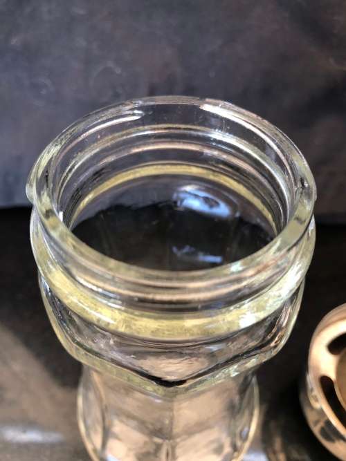 VINTAGE GLASS CASTOR AND SYRUP DISPENSER WITH SILVER PLATED TOPS  - AS A LOT