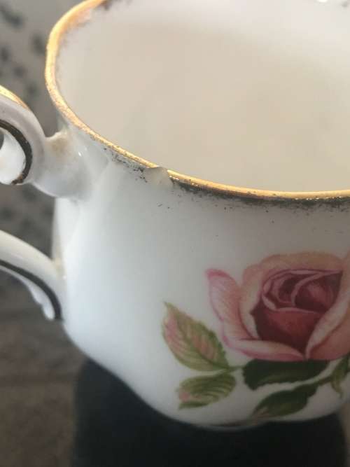 2 Rose Tea Cups By  Royal Albert " Anniversary Rose & American Beauty " 1 cup small chip
