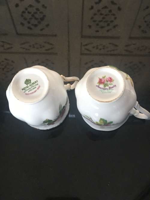 2 Rose Tea Cups By  Royal Albert " Anniversary Rose & American Beauty " 1 cup small chip