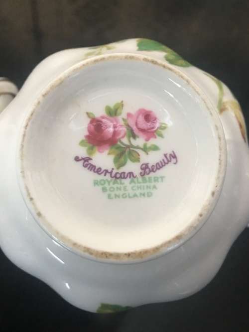 2 Rose Tea Cups By  Royal Albert " Anniversary Rose & American Beauty " 1 cup small chip