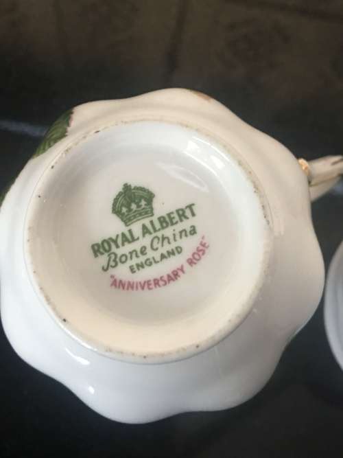2 Rose Tea Cups By  Royal Albert " Anniversary Rose & American Beauty " 1 cup small chip