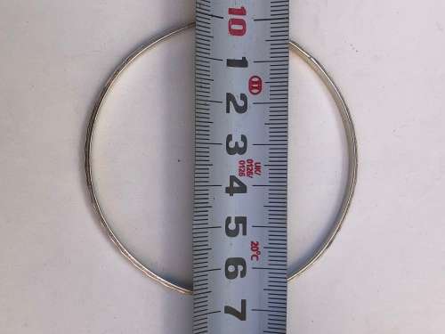 .925 STERLING SILVER SILVER 65mm BANGLE - 7.66 grams - NO MARKINGS BUT TESTED POSITIVE