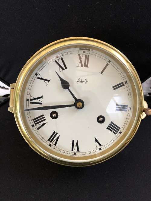 FANTASTIC SCHATZ BRASS SHIPS BULKHEAD CLOCK - CHIMES OUT THE SHIFT CHANGE - FULL WORKING ORDER