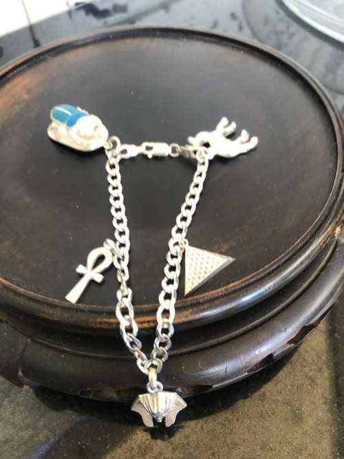 STUNNING STERLING SILVER CHARM BRACELET - WITH 5 EGYPTIAN CHARMS - CLEARLY MARKED - 24.3g