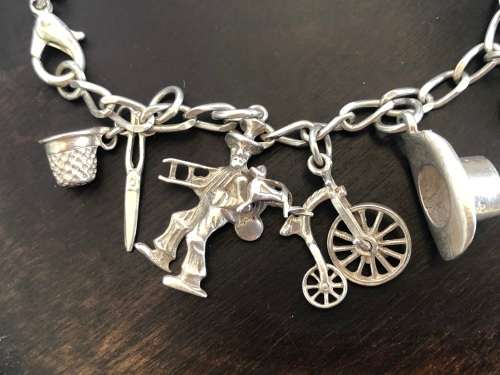 STUNNING STERLING SILVER CHARM BRACELET - WITH 15 OLD RARE CHARMS - CLEARLY MARKED - 33.52g