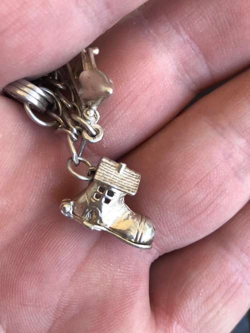 STUNNING STERLING SILVER CHARM BRACELET - WITH 15 OLD RARE CHARMS - CLEARLY MARKED - 33.52g