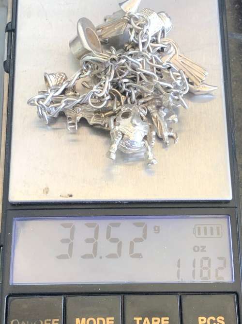 STUNNING STERLING SILVER CHARM BRACELET - WITH 15 OLD RARE CHARMS - CLEARLY MARKED - 33.52g