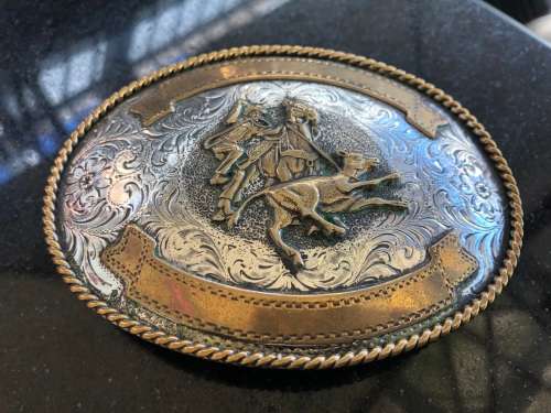BEAUTIFUL LARGE SILVERPLATED AND BRASS HAND MADE AND ENGRAVED WESTERN BELT BUCKLE