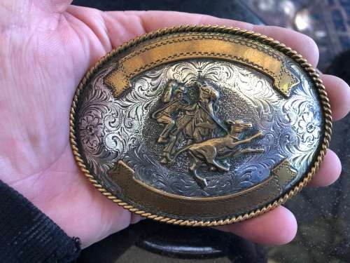 BEAUTIFUL LARGE SILVERPLATED AND BRASS HAND MADE AND ENGRAVED WESTERN BELT BUCKLE