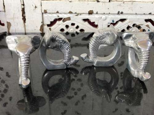 WOW !!! GORGEOUS SET OF FOUR CAST ALUMINIUM ELEPHANT SHAPED SERVIETTE RINGS
