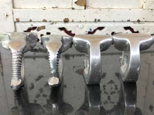 WOW !!! GORGEOUS SET OF FOUR CAST ALUMINIUM ELEPHANT SHAPED SERVIETTE RINGS