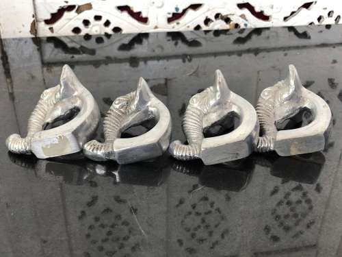 WOW !!! GORGEOUS SET OF FOUR CAST ALUMINIUM ELEPHANT SHAPED SERVIETTE RINGS