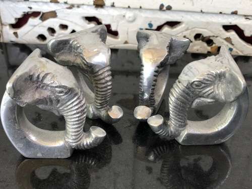 WOW !!! GORGEOUS SET OF FOUR CAST ALUMINIUM ELEPHANT SHAPED SERVIETTE RINGS