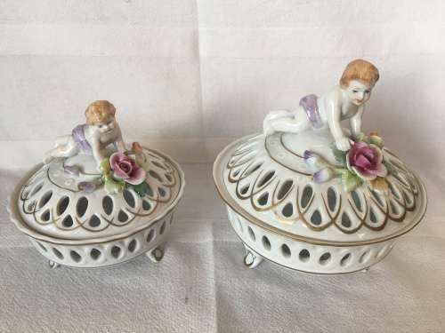 A Set Antique Dresden Von Schierholz Footed Pierced Porcelain Cherub Potpourri Baskets & Covers