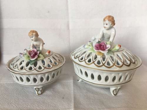 A Set Antique Dresden Von Schierholz Footed Pierced Porcelain Cherub Potpourri Baskets & Covers