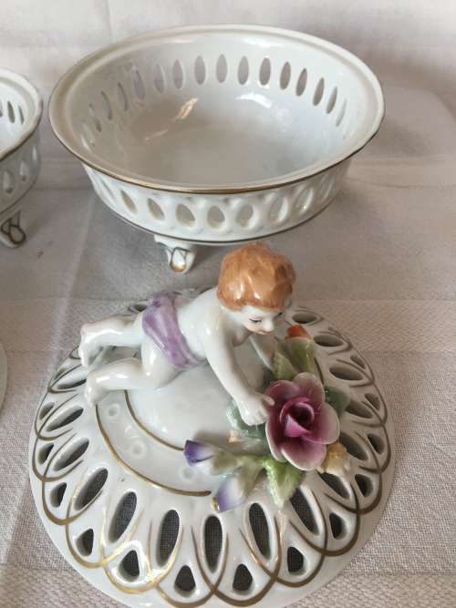 A Set Antique Dresden Von Schierholz Footed Pierced Porcelain Cherub Potpourri Baskets & Covers