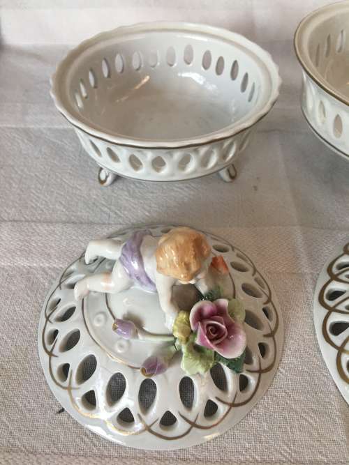 A Set Antique Dresden Von Schierholz Footed Pierced Porcelain Cherub Potpourri Baskets & Covers