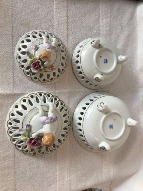 A Set Antique Dresden Von Schierholz Footed Pierced Porcelain Cherub Potpourri Baskets & Covers