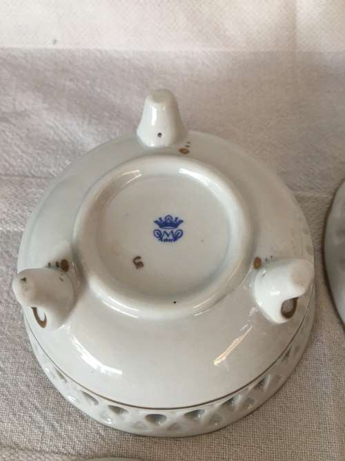 A Set Antique Dresden Von Schierholz Footed Pierced Porcelain Cherub Potpourri Baskets & Covers