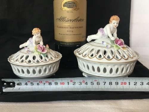 A Set Antique Dresden Von Schierholz Footed Pierced Porcelain Cherub Potpourri Baskets & Covers