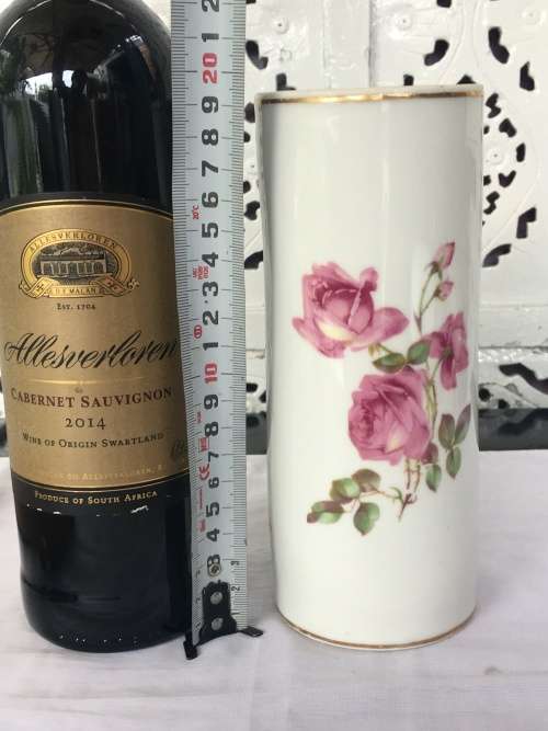 Vintage Porelain Floral Rolling Pin with detachable wooden handles. Numbered 13683