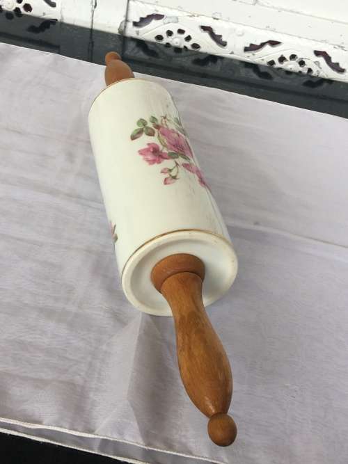 Vintage Porelain Floral Rolling Pin with detachable wooden handles. Numbered 13683