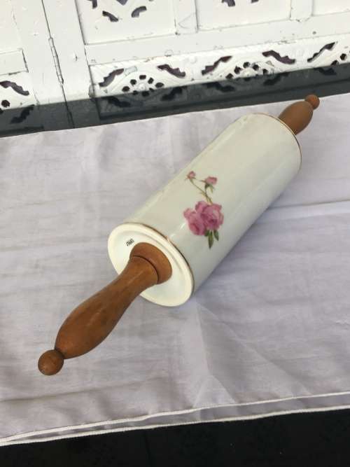Vintage Porelain Floral Rolling Pin with detachable wooden handles. Numbered 13683
