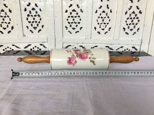 Vintage Porelain Floral Rolling Pin with detachable wooden handles. Numbered 13683