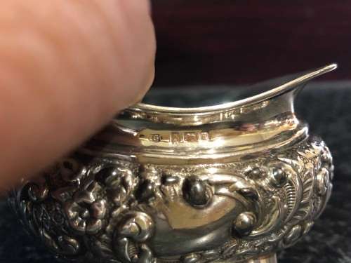 PAIR BIRMINGHAM HALLMARKED STERLING SILVER REPOUSSE OPEN SALTS WITH SPOONS - MARKINGS RUBBED - 66.2g