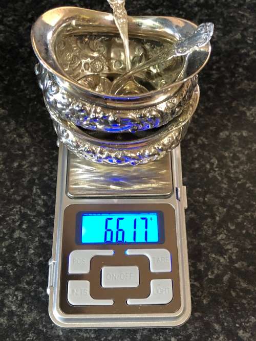 PAIR BIRMINGHAM HALLMARKED STERLING SILVER REPOUSSE OPEN SALTS WITH SPOONS - MARKINGS RUBBED - 66.2g
