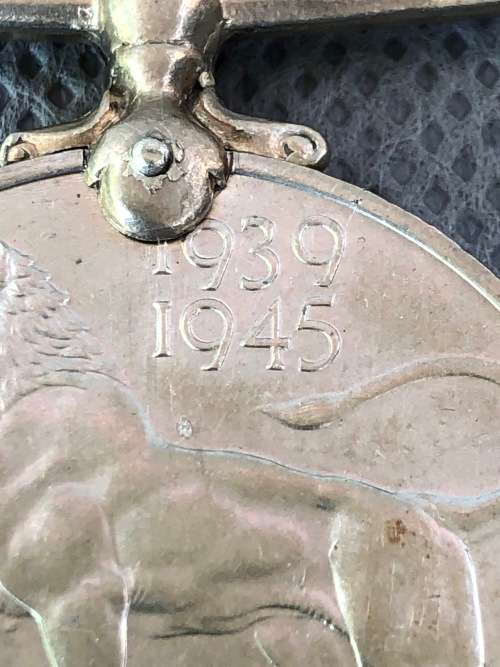 COLLECTIBLE WW II MEDAL 1939-1945 GEORGIVS VI D:G:BR:OMN:REX ET INDIAE IMP - AWARDED TO J.W. BOWYER