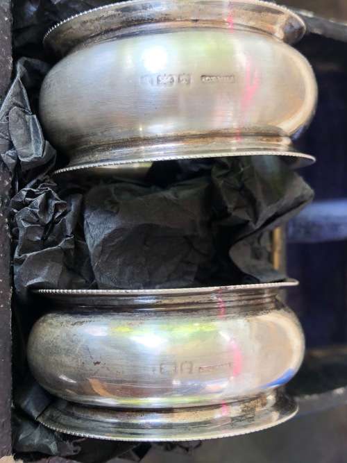 STERLING SILVER HALLMARKED BOXED PAIR OF NAPKIN RINGS - F.H. ADAMS & CO BIRMINGHAM - 23.76g