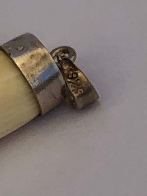 STERLING SILVER MOUNTED CARVED IVORY COLOUR ANIMAL PRODUCT PENDANT - MARKED 925